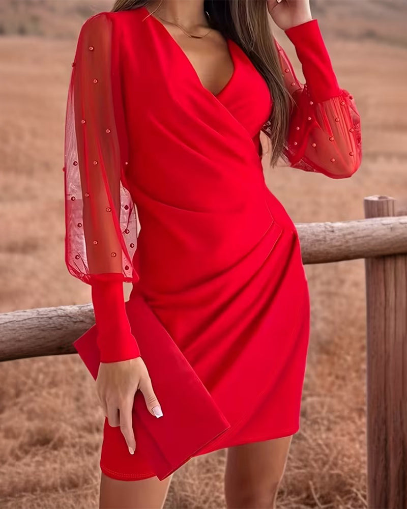 Sukienka z siateczki z dekoltem w serek